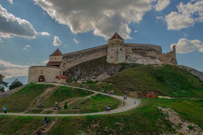 3-Castle: Peles,Bran,Rasnov,Sinaia Monastery from Brasov w pickup - A quick Brasov drive adds local context
