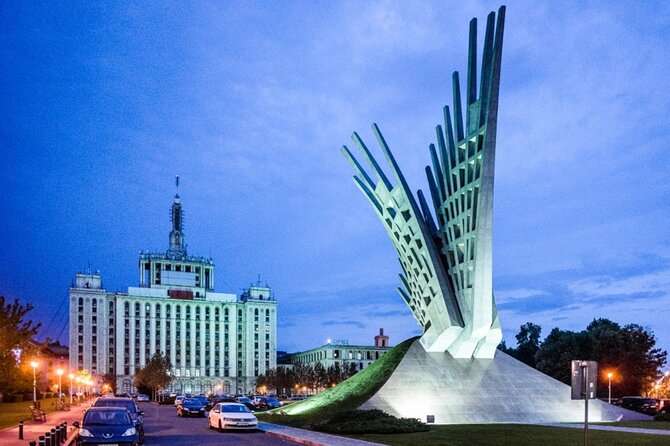 4h Bucharest Panoramic Tour by Car with stops - House of the Free Press reveals another Communist-era marker
