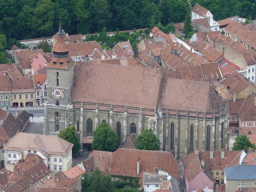 Brasov: Candlelight Tour of Medieval Architecture - The Black Church after sunset