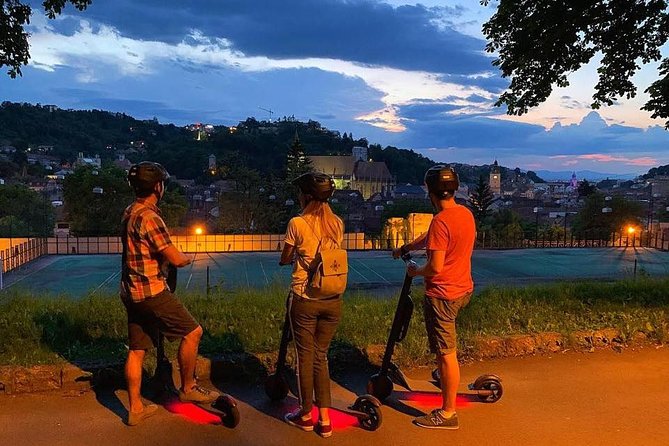 Brasov Old Town Guided Tour With Electric Scooters - Schei, Saint Nicholas, and the old city gates