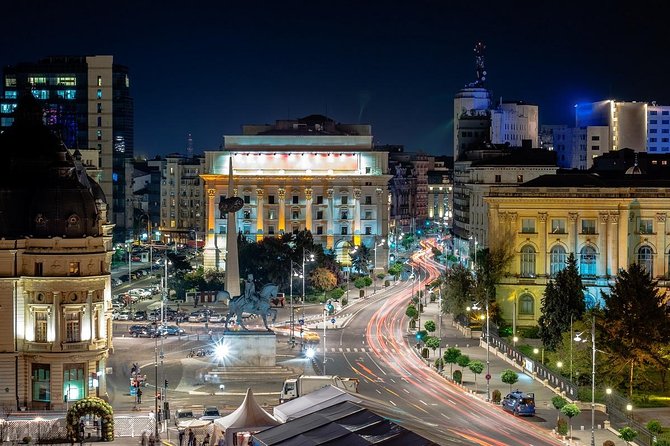 Bucharest Evening Tour and Traditional Dinner - 3 hours - Passing the Palace of Parliament after dark