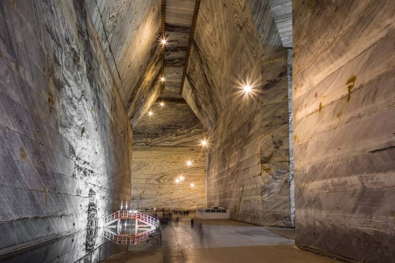 Bucharest: Salt Mine Guided Day Trip to Slănic - Riding down 208 meters into the salt mine