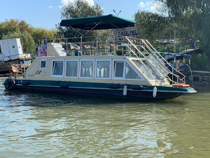 Daily Tours in the Danube Delta - Camely Boat Cruise - Onboard comfort: coffee, peanuts, and a dry place to sit