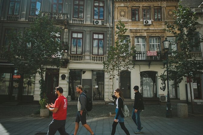 Discover Bucharest: Private Highlights and Traditional Food Tour - The communist story at Piata Unirii