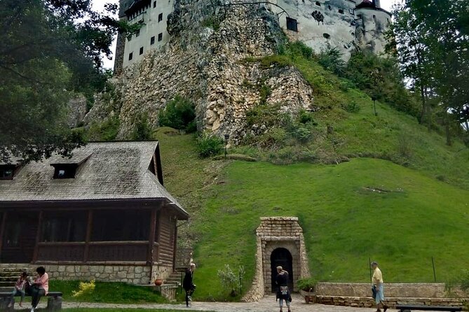Libearty Bear Sanctuary and Dracula's Castle - Day Tour from Bucharest - Entering Bran Castle, Romania’s Dracula postcard