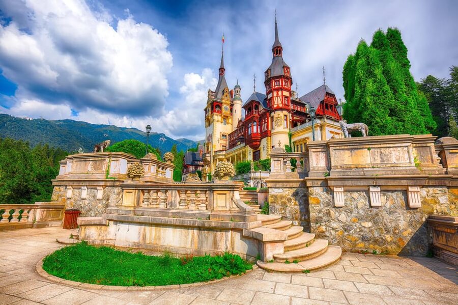 Minivan 8: Peles & Dracula's Castle and Brasov Full-Day Trip - Riding north in an eight-seat minivan