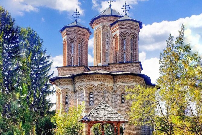 Mystical Monasteries, Dracula's Tomb and Mogosoaia Lake Palace - Private Tour - Leaving Bucharest through the city’s historic center