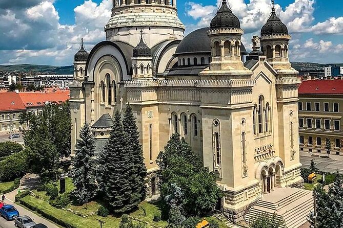 Private city tour in Cluj-Napoca - A medieval corner tower and marks of a siege