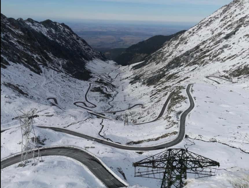 Small group Bears 'Safari' on Transfăgărășan -max 7 tourists - Vidraru Dam, a 166-meter engineering feat