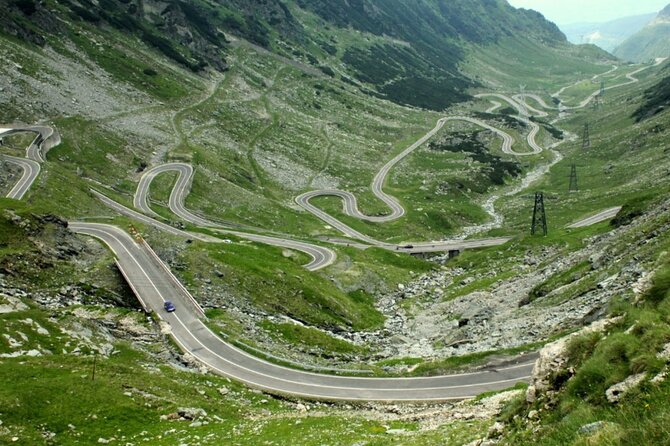 Small group max 7, Transfăgărășan the Top Gear Road - Vidraru Dam and the wide blue lake below