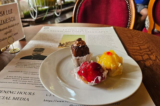 Sweet Delights History and Desserts Walking Tour in Bucharest - Starting with an éclair at the Romanian Athenaeum