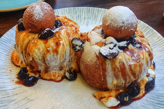Sweet Delights History and Desserts Walking Tour in Bucharest - Old Town and the final papanasi
